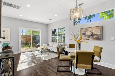 a living room with furniture or couch and a window