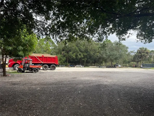a view of a street with cars