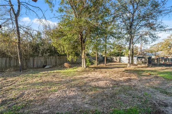 a fire hydrant in the middle of a field