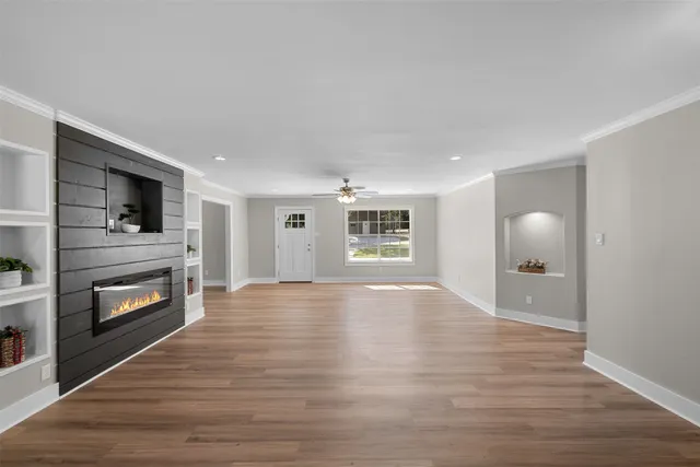 a living room with a fireplace