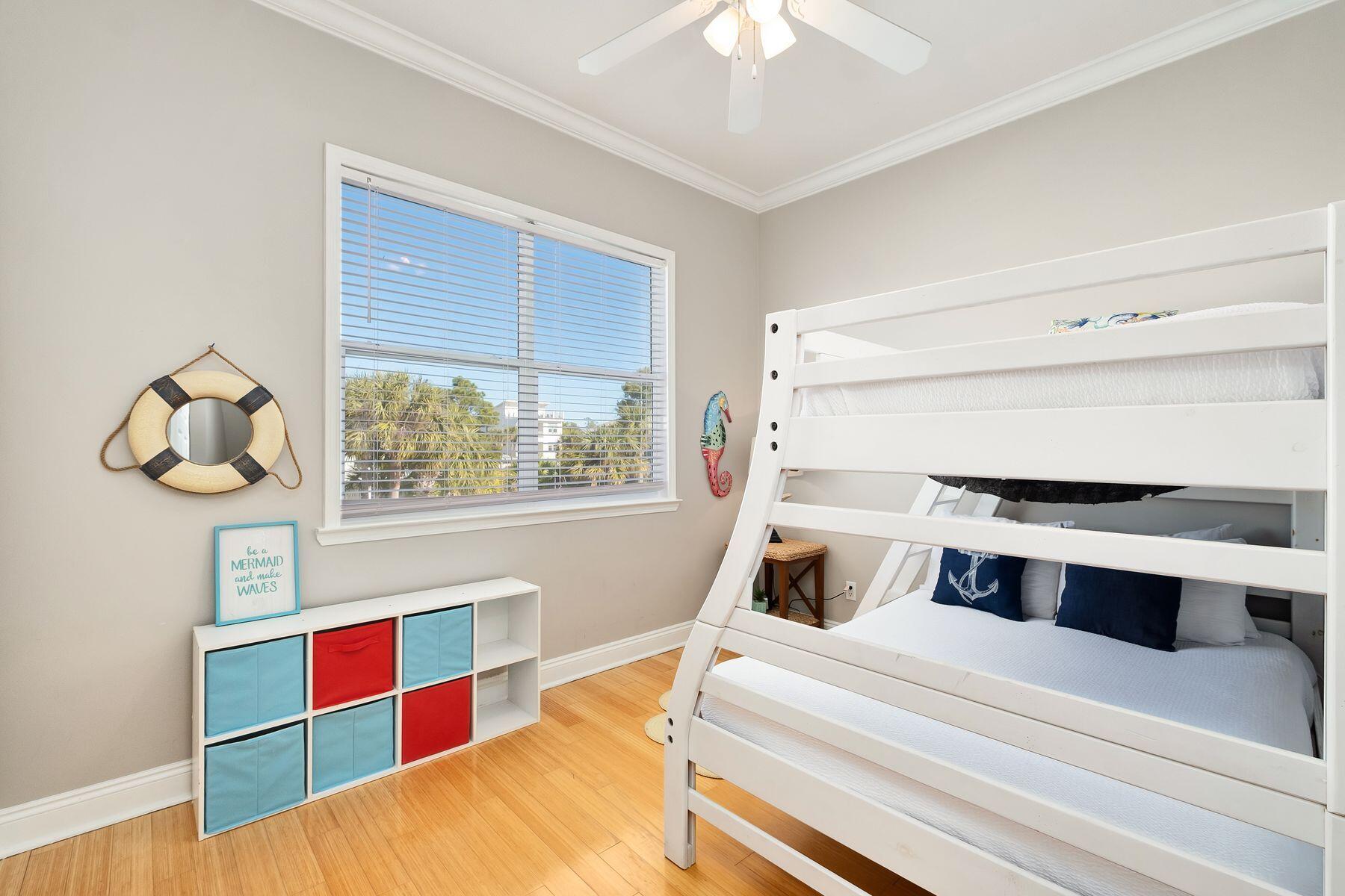 172 Sugar Sand Lane Santa Rosa Beach, FL 32459 - Photo 18 of 40 a bedroom with a bed and window