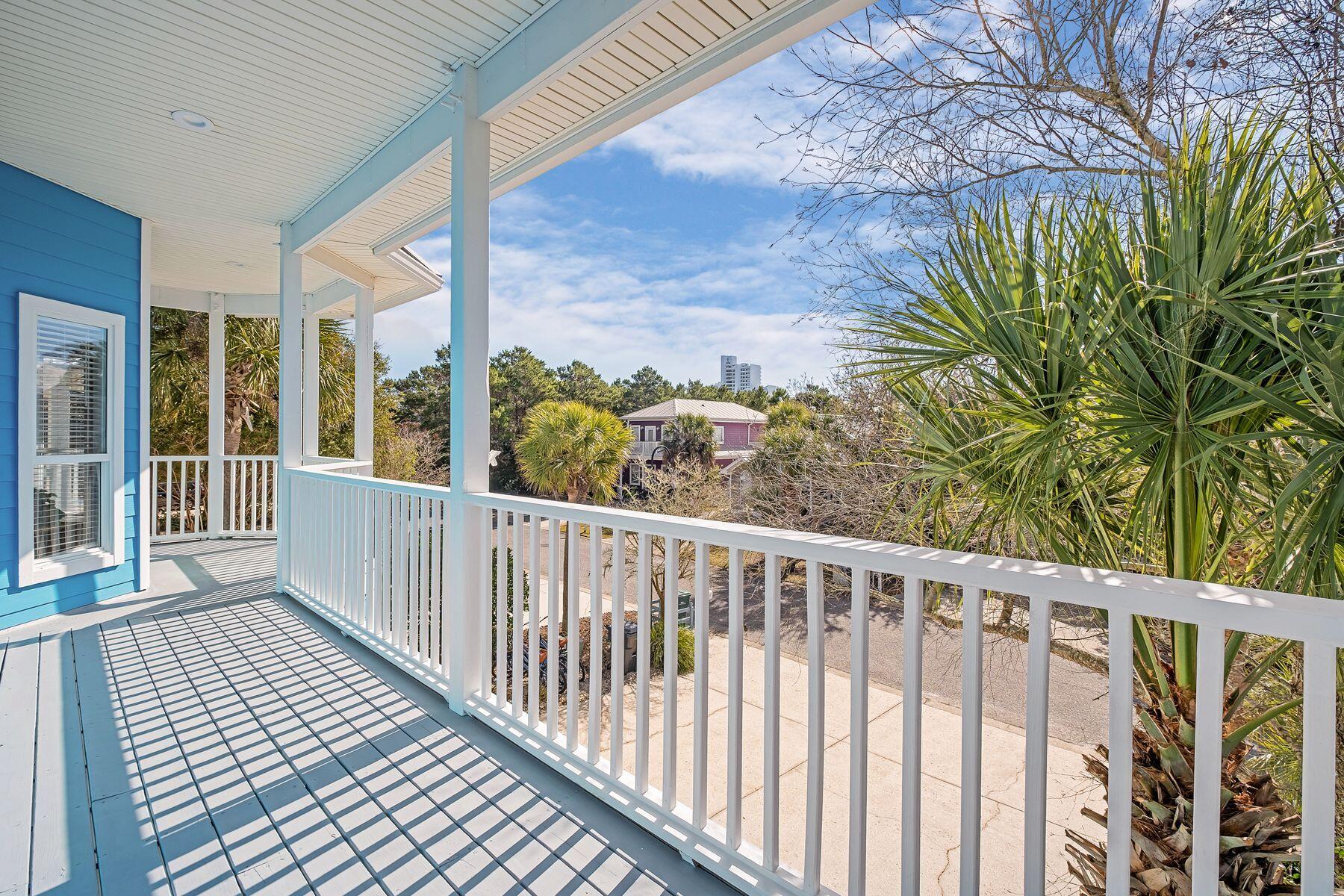 172 Sugar Sand Lane Santa Rosa Beach, FL 32459 - Photo 27 of 40 a view of a balcony with wooden floor