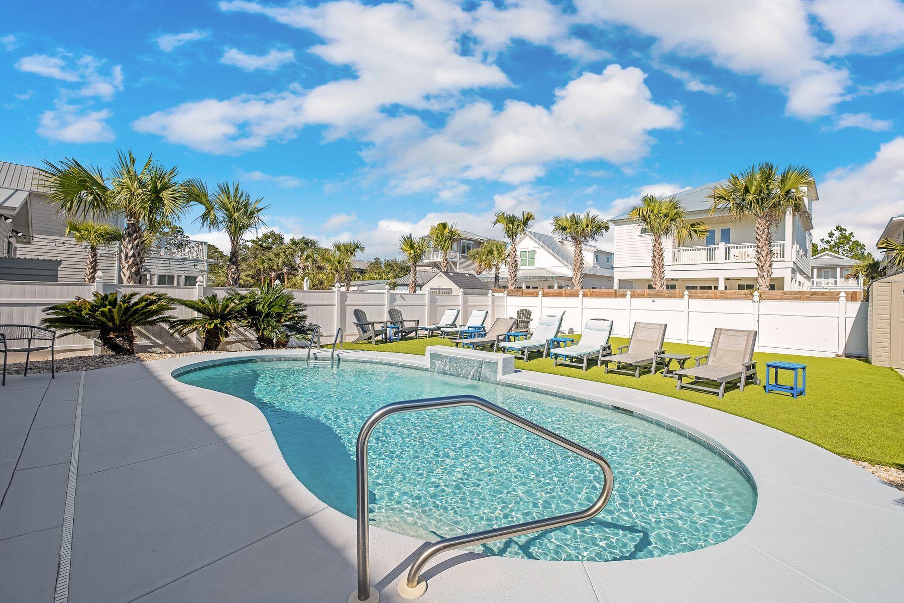 172 Sugar Sand Lane Santa Rosa Beach, FL 32459 - Photo 35 of 40 a view of a swimming pool with outdoor seating