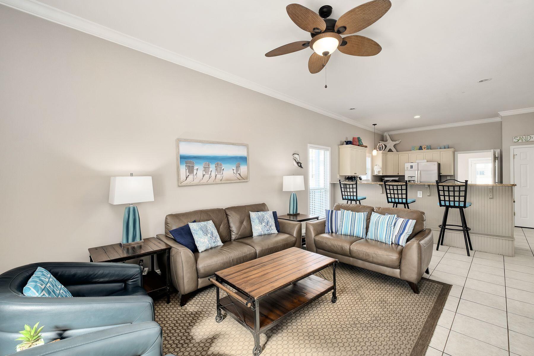 172 Sugar Sand Lane Santa Rosa Beach, FL 32459 - Photo 5 of 40 a living room with furniture and a rug