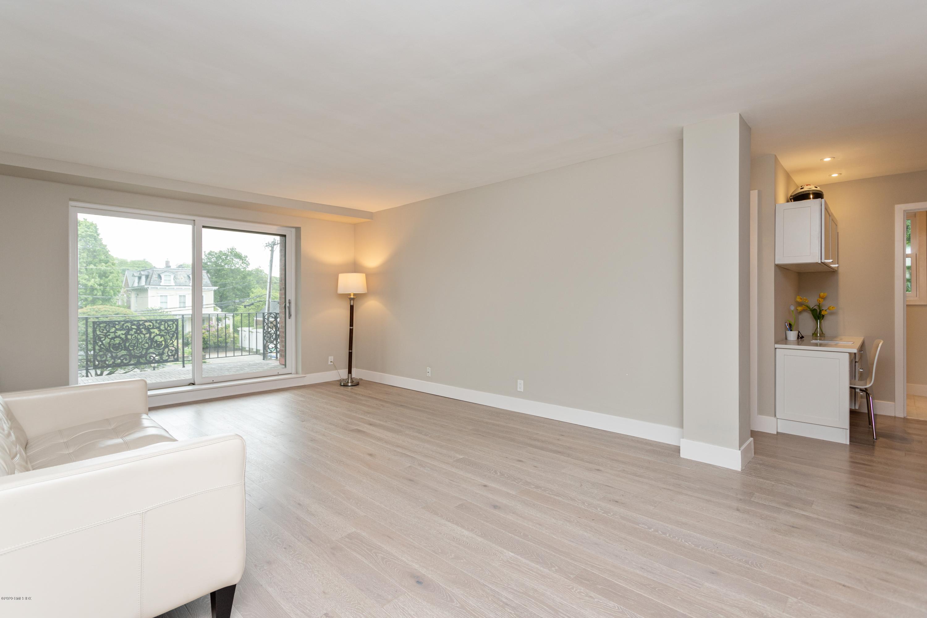 630 Steamboat Road, Unit 2E Greenwich, CT 06830 - Photo 25 of 46 Living Room with Sliders