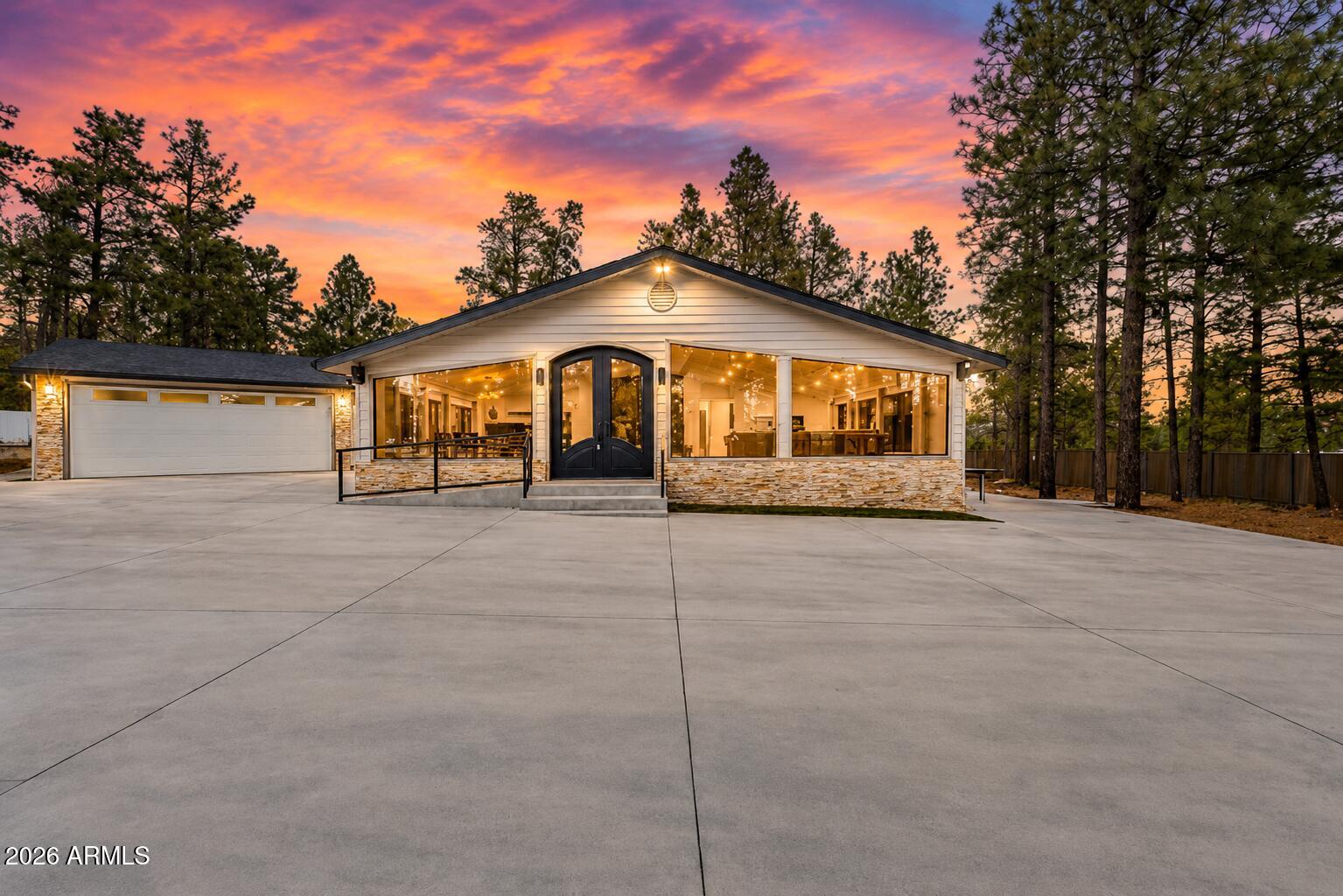 5055 Townsend-Winona Road Flagstaff, AZ 86004 - Photo 3 of 34 a front view of a house with a yard
