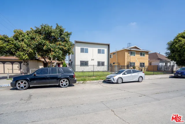 a car parked in front of a house