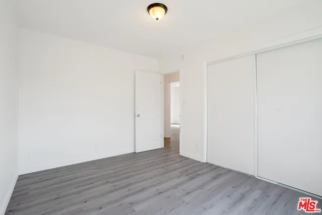 a view of a livingroom with wooden floor