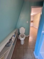 38 Cedar Street, Unit 1 Holliston, MA 01746 - Photo 14 of 15 a bathroom with a toilet