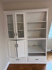38 Cedar Street, Unit 1 Holliston, MA 01746 - Photo 10 of 15 a view of walk in closet with empty racks