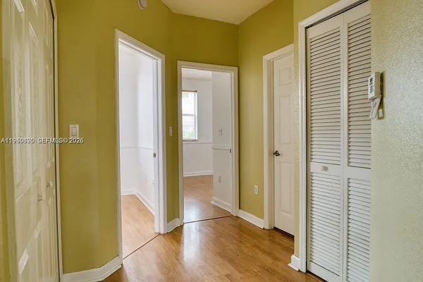 a view of a room that has a window in it