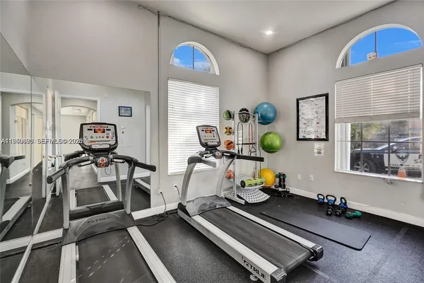 a view of a room with gym equipment