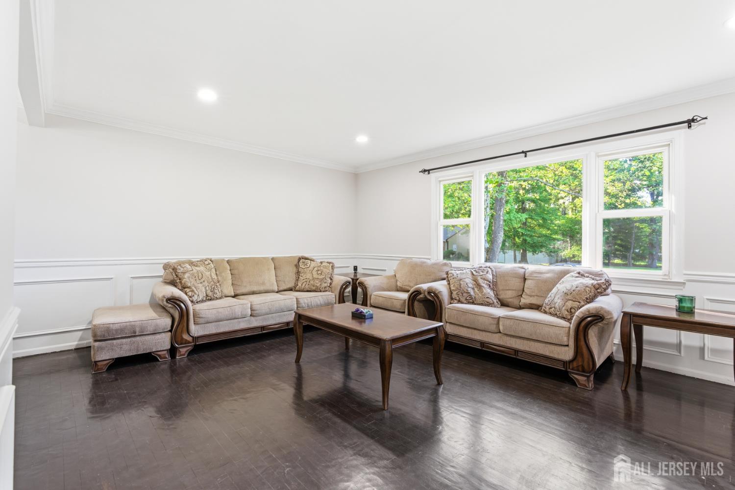 5 McKinley Street Edison, NJ 08820 - Photo 6 of 38 a living room with furniture and a large window
