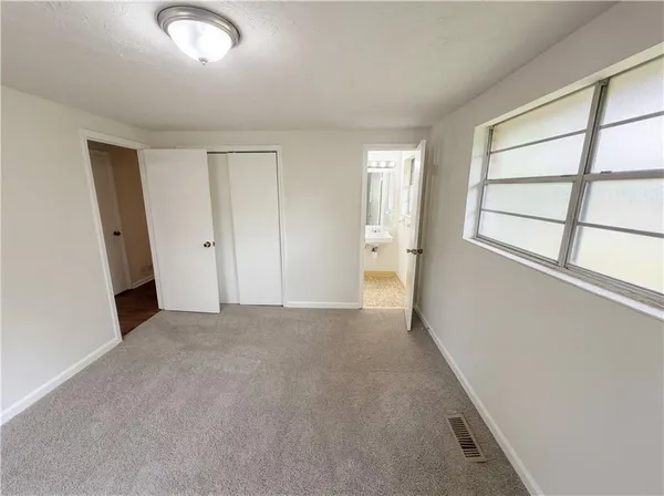 an empty room with a window