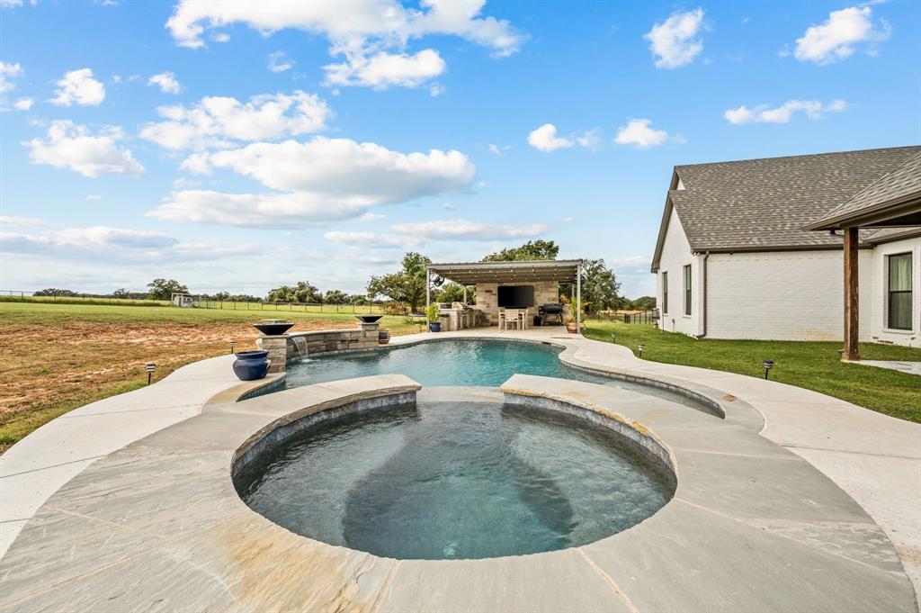 175 County Road 1109 Decatur, TX 76234 - Photo 27 of 39 a view of a swimming pool with an ocean view
