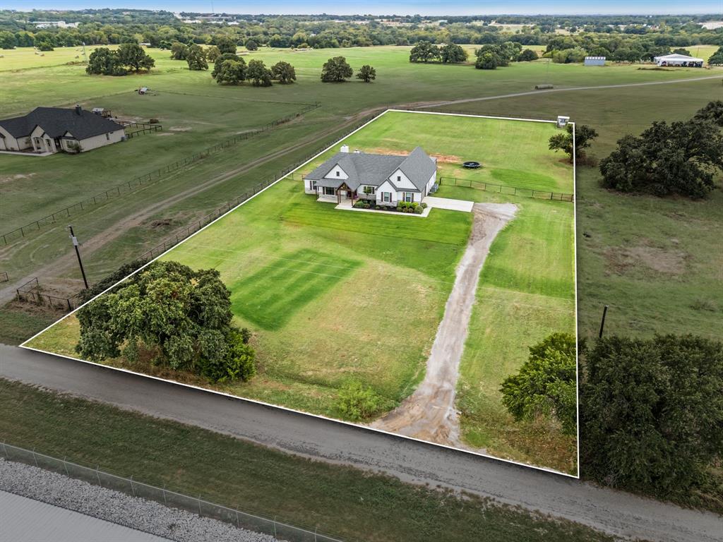175 County Road 1109 Decatur, TX 76234 - Photo 3 of 39 a view of a lake with a big yard