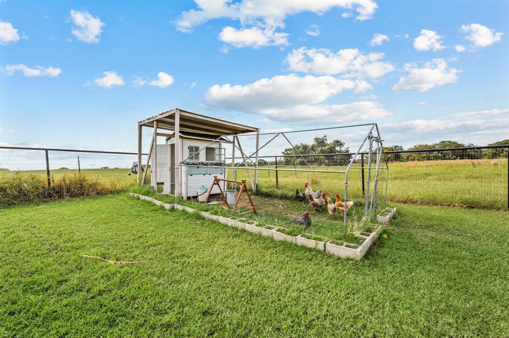175 County Road 1109 Decatur, TX 76234 - Photo 33 of 39 a view of a lake with a big yard