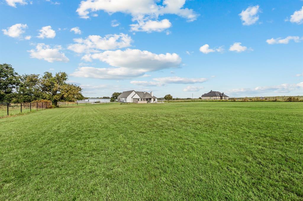 175 County Road 1109 Decatur, TX 76234 - Photo 34 of 39 a view of yard with outdoor seating and green space