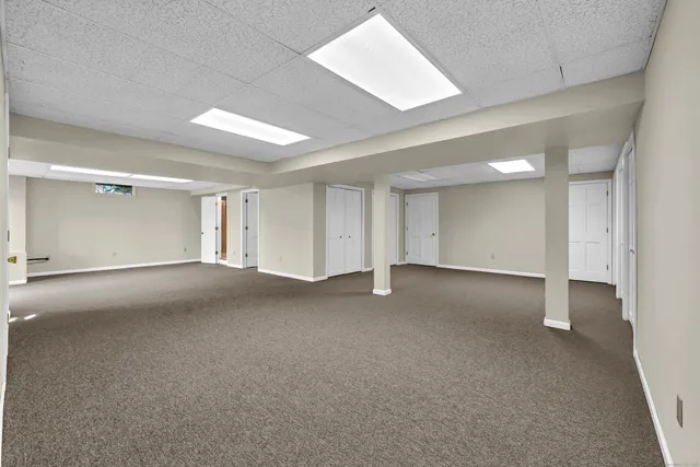 a view of a room with large windows