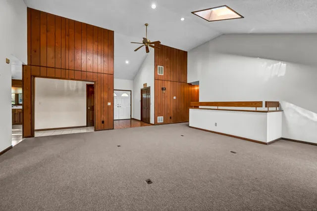 a view of a kitchen with furniture and window