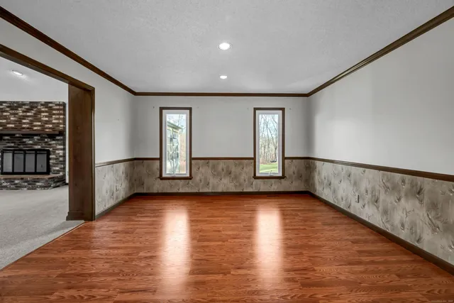 a view of an empty room with a window