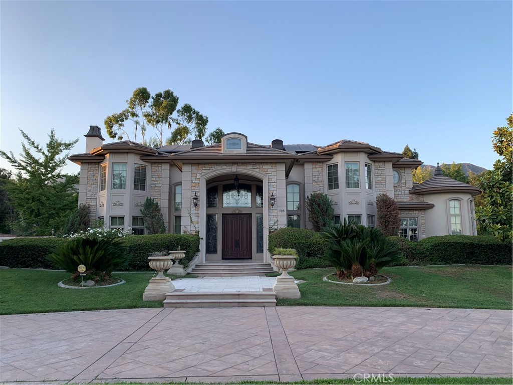 735 Hampton Road Arcadia, CA 91006 - Photo 1 of 1 a front view of a house with garden
