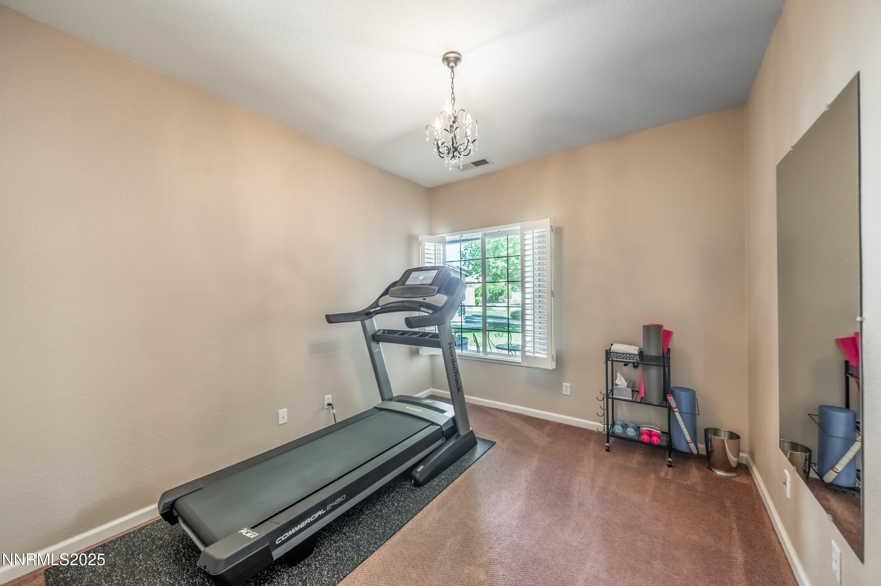9578 Rusty Nail Court Reno, NV 89521 - Photo 22 of 38 a view of a room with gym equipment