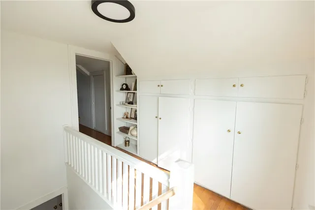 a view of a hallway with shelf