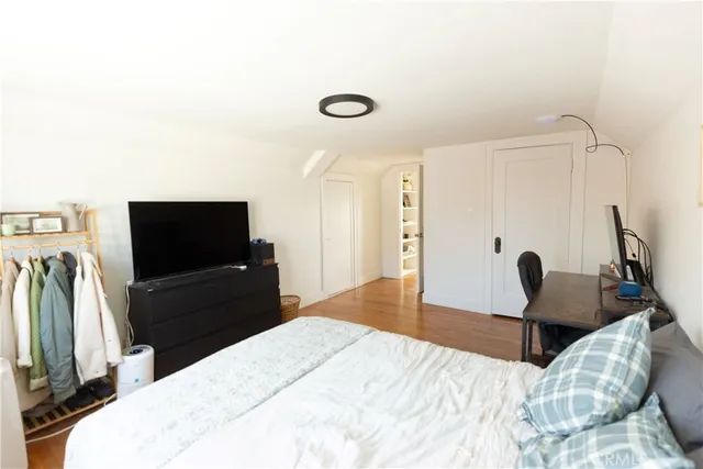 a view of a patio with table and chairs and potted plants