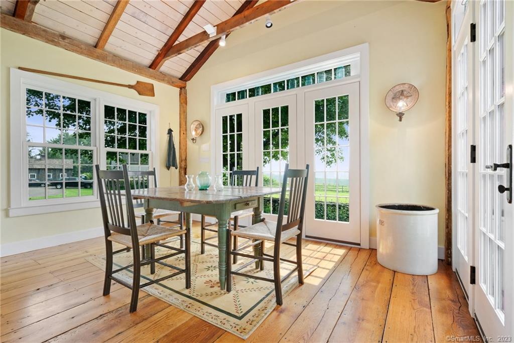 35 Northrup Street Bridgewater, CT 06752 - Photo 5 of 24 Kitchen dining opens to patio.