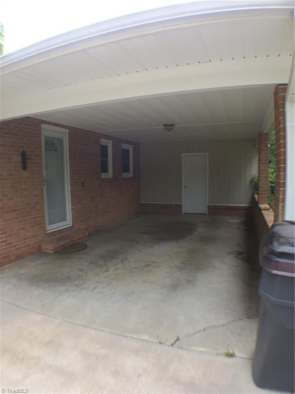 310 McCoy Road Reidsville, NC 27320 - Photo 16 of 19 carport with side entry and extra storage room