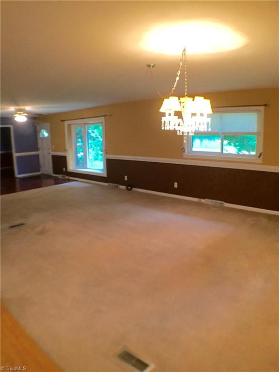 310 McCoy Road Reidsville, NC 27320 - Photo 5 of 19 View of living room and dining area from the kitchen