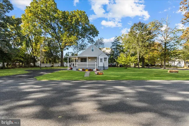 a view of a house with a big yard