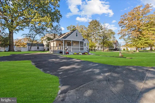 a front view of a building with garden