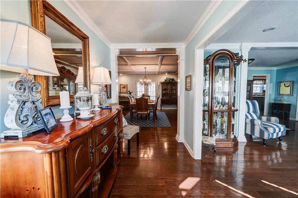 651 Camelot Circle Northwest Calhoun, GA 30701 - Photo 2 of 56 a view of a living room and dining room