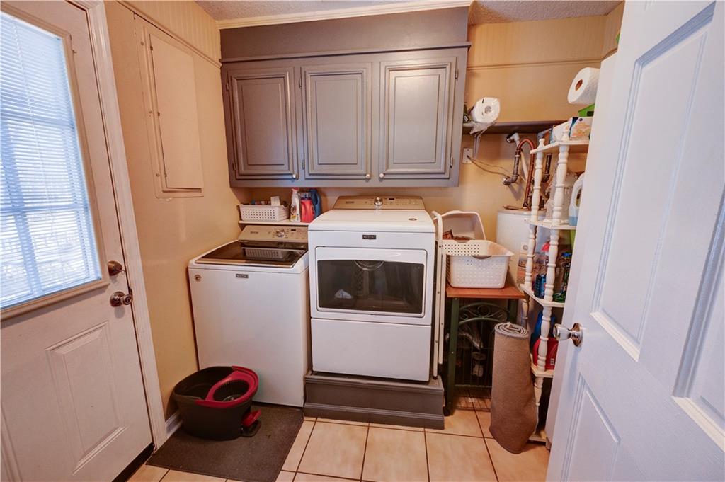 651 Camelot Circle Northwest Calhoun, GA 30701 - Photo 21 of 56 a utility room with dryer and washer