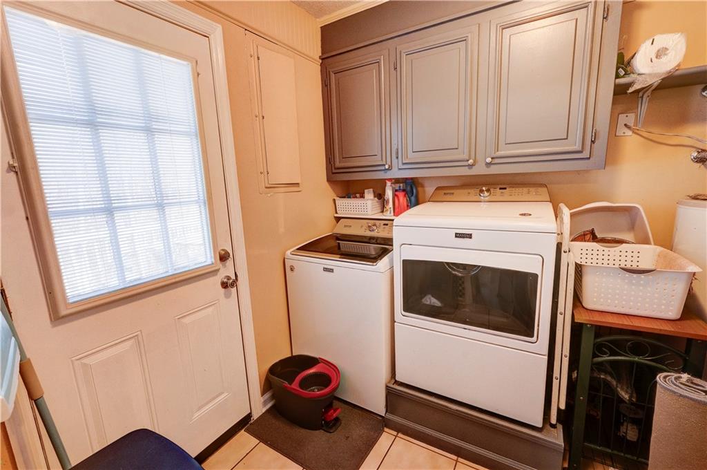 651 Camelot Circle Northwest Calhoun, GA 30701 - Photo 22 of 56 a utility room with dryer and washer