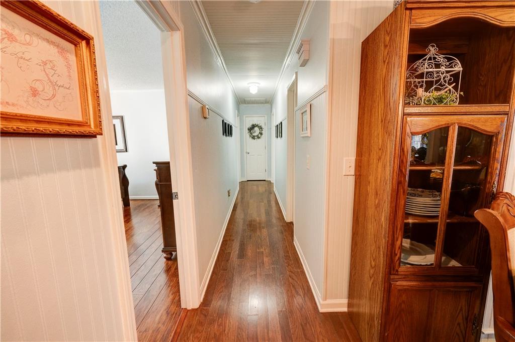651 Camelot Circle Northwest Calhoun, GA 30701 - Photo 26 of 56 a view of walk in closet with clothes and shoes
