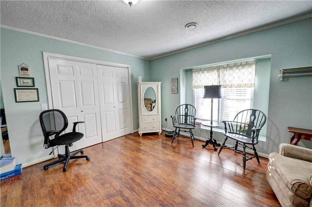 651 Camelot Circle Northwest Calhoun, GA 30701 - Photo 40 of 56 a view of a livingroom with workspace