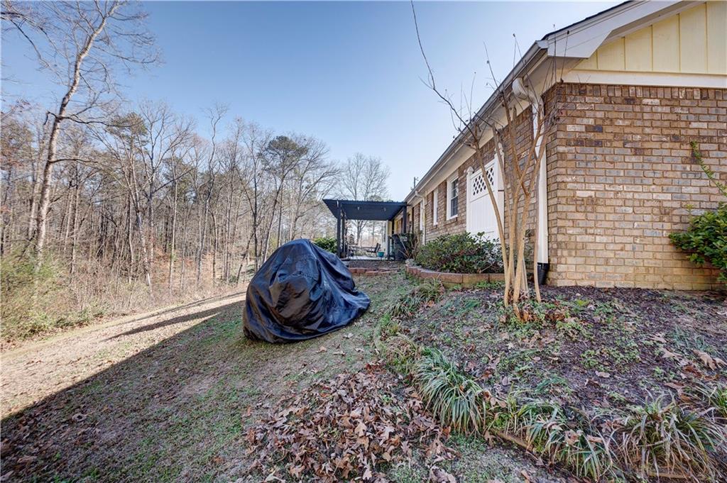 651 Camelot Circle Northwest Calhoun, GA 30701 - Photo 47 of 56 a view of backyard with green space
