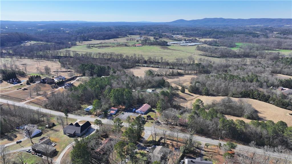 651 Camelot Circle Northwest Calhoun, GA 30701 - Photo 53 of 56 an aerial view of house with a yard