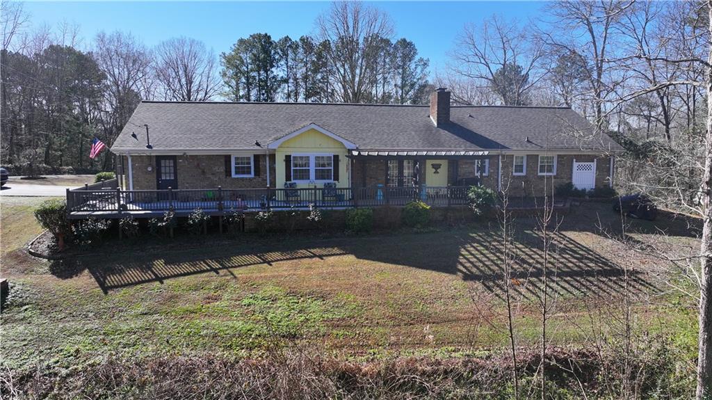 651 Camelot Circle Northwest Calhoun, GA 30701 - Photo 56 of 56 a front view of a house with a yard