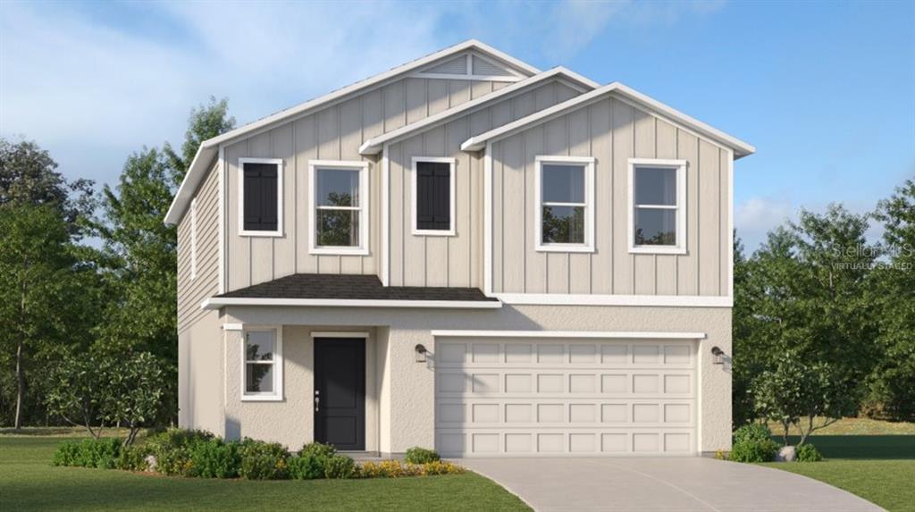 2411 Bluestone Road Haines City, FL 33844 - Photo 1 of 1 a front view of a house with garden