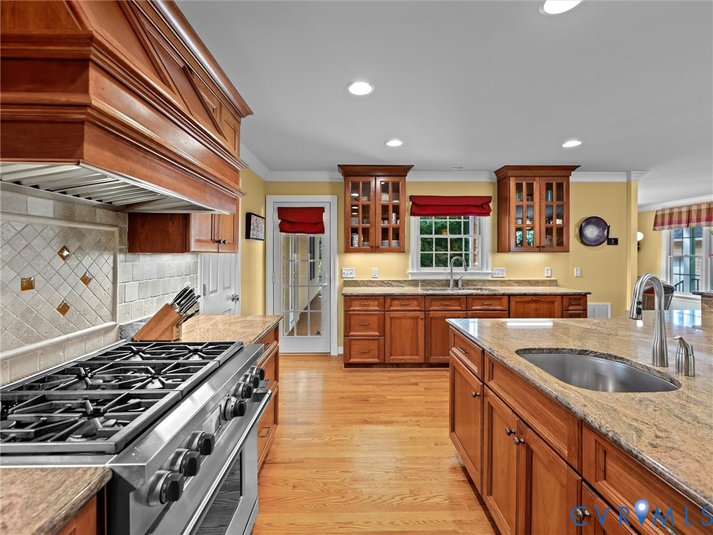 4428 Shirley Road Richmond, VA 23225 - Photo 23 of 70 Gleaming custom cabinetry and a six-burner Wolf st