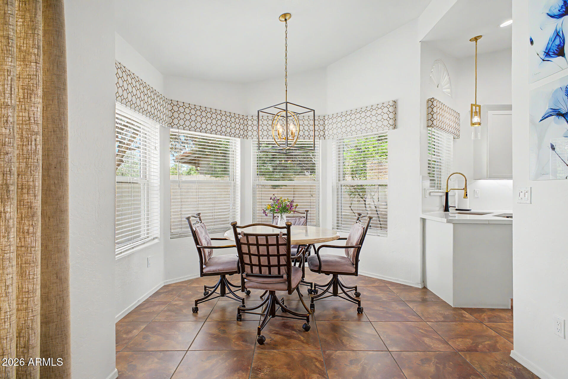 1924 East El Freda Road Tempe, AZ 85284 - Photo 13 of 56 a view of a dining room with furniture window and outside view