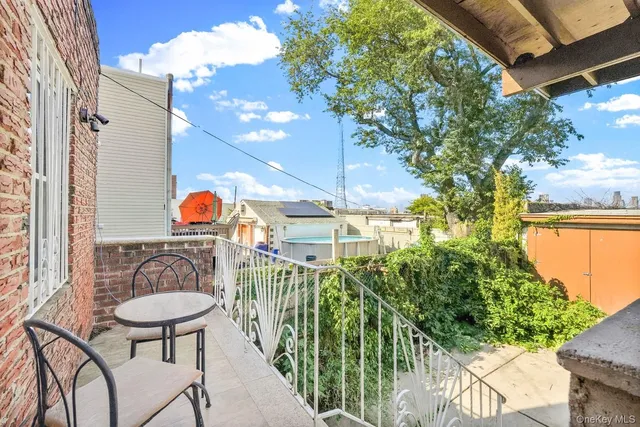 a outdoor view with a seating space