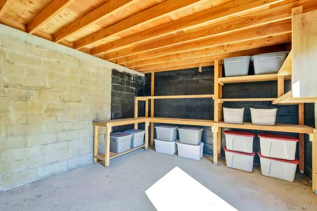 a view of an empty room with a fireplace