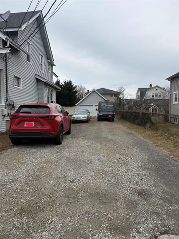 a cars parked in front of a house
