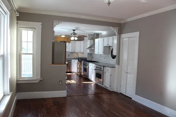 a bathroom with a sink toilet and mirror