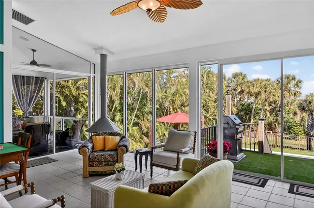 a kitchen with stainless steel appliances granite countertop a stove a refrigerator and a sink with granite countertops